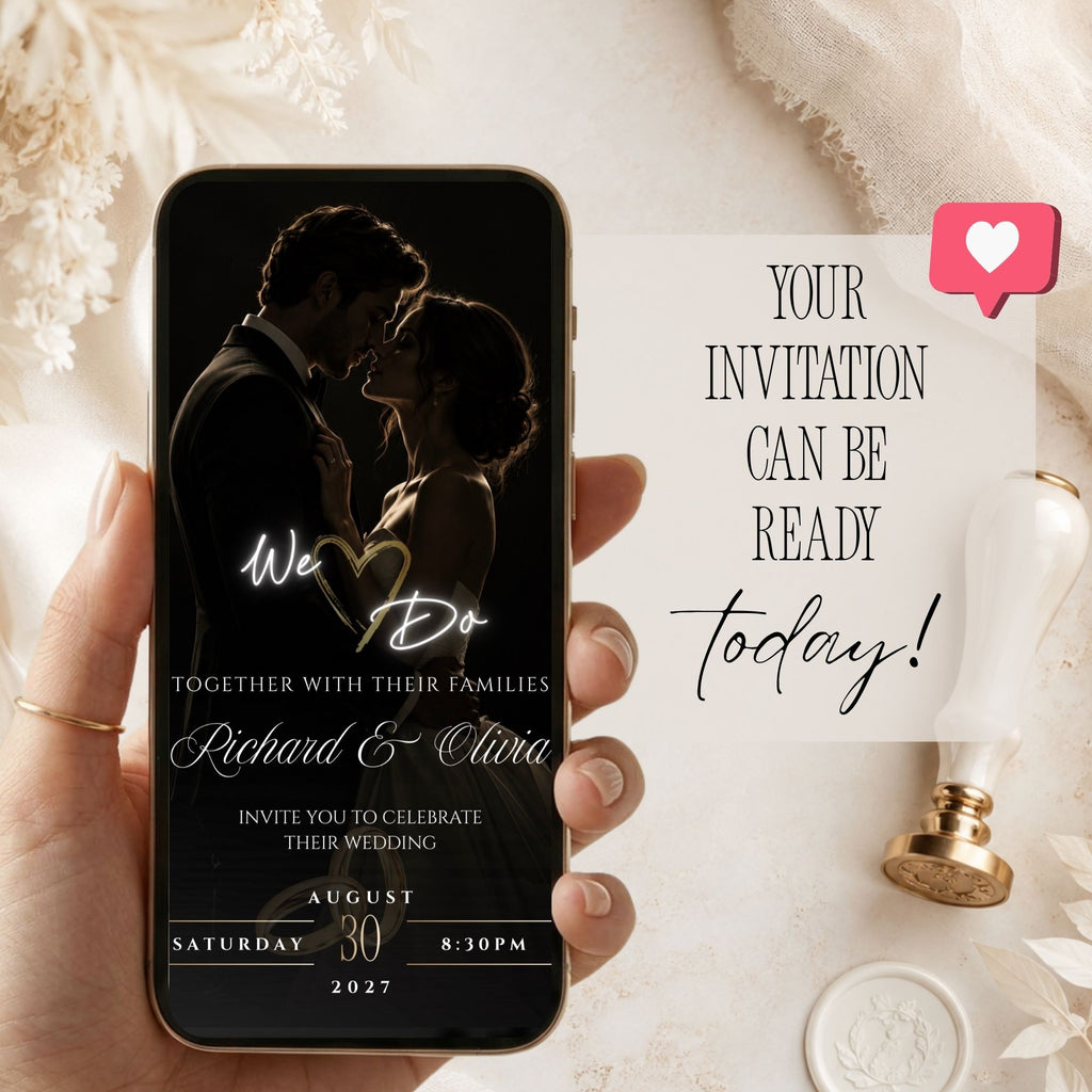 Black and gold online wedding invitation displayed on a mobile phone with romantic couple photography and elegant gold details.