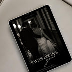 Black tie wedding website displayed on a tablet with elegant black and white couple photography and editorial styling.