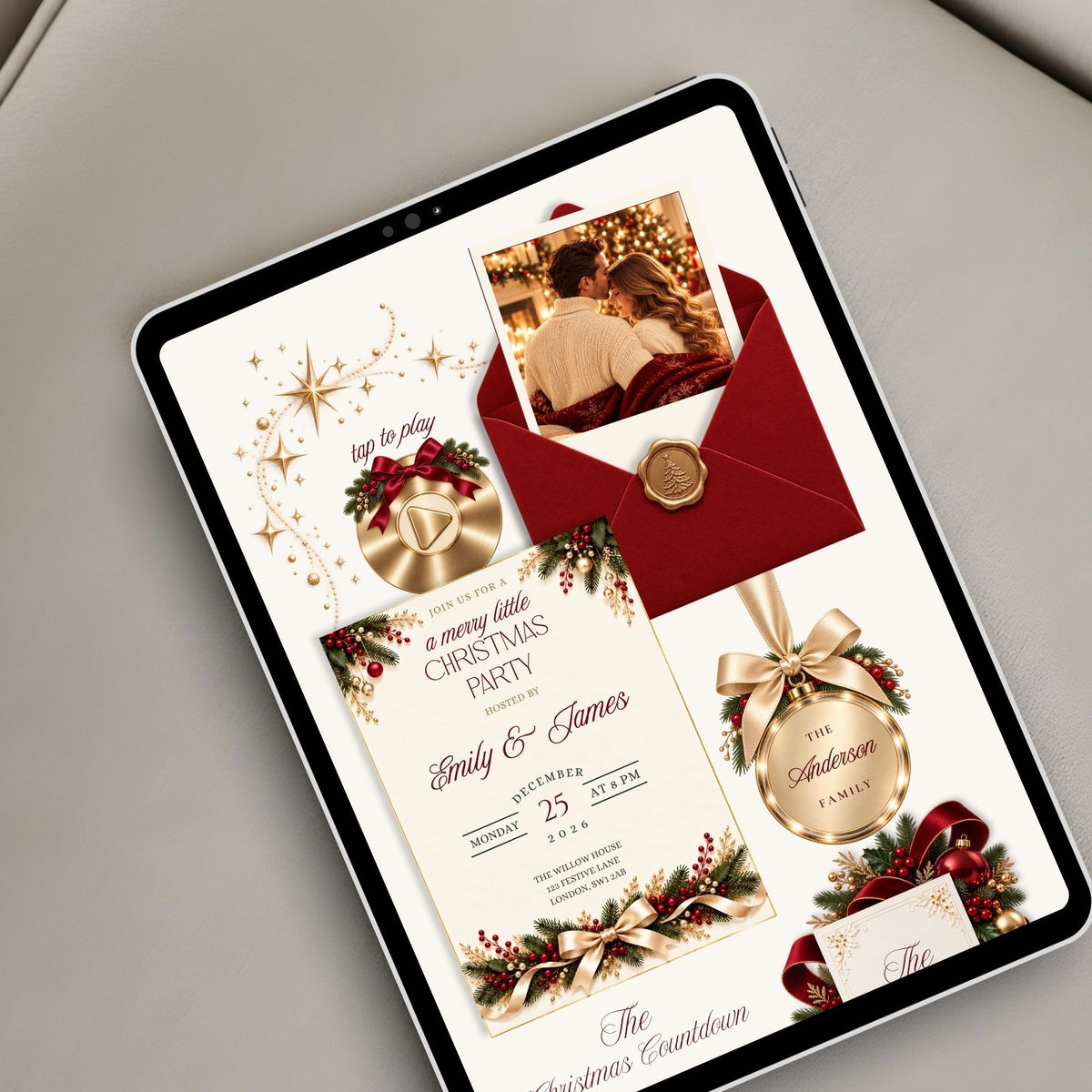 Elegant burgundy Christmas party website invitation displayed on a tablet with festive greenery, gold ornaments, holiday photographs, and Christmas event details.