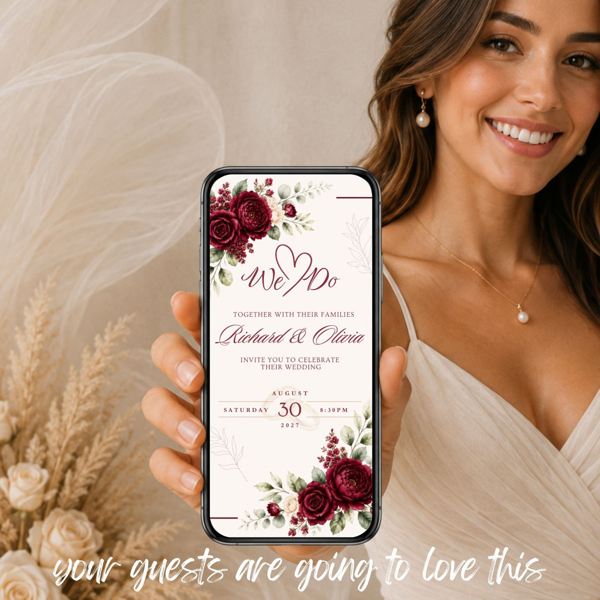 Burgundy floral wedding video invitation displayed on a mobile phone featuring a personalised animated wedding announcement.
