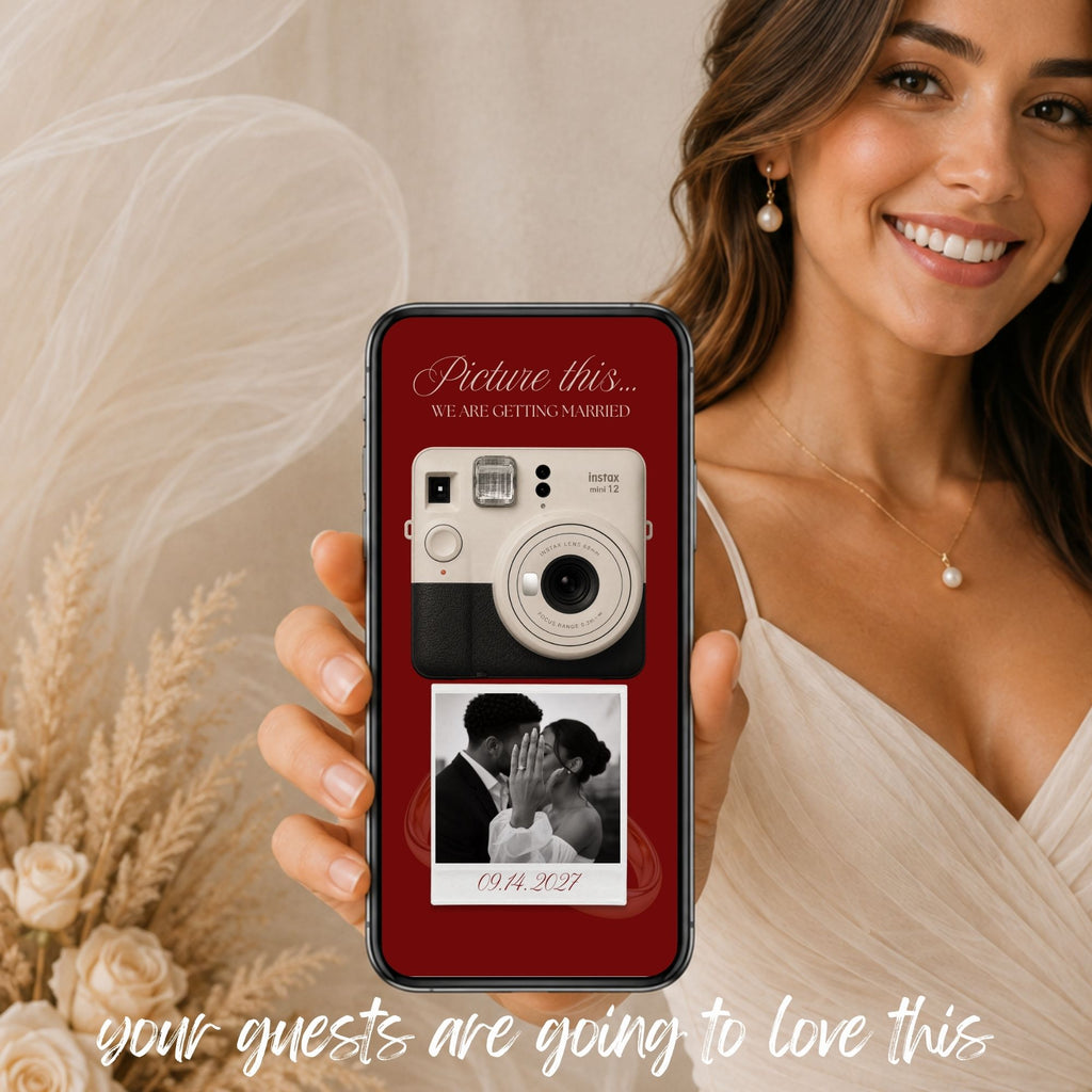 Bride holding a phone displaying an elegant burgundy Save the Date video invitation with a vintage camera and couple photographs.