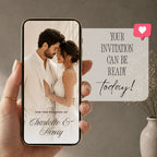 Digital ivory wedding save the date displayed on a mobile phone with romantic couple photograph and elegant invitation wording.