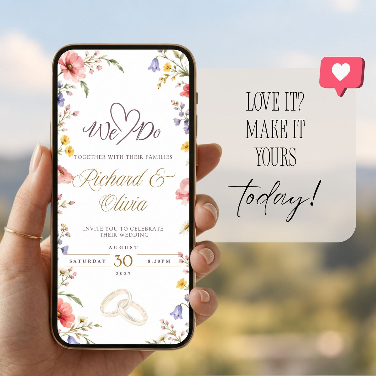 Digital wildflower wedding invitation displayed on a phone with romantic floral border and personalized wedding details.