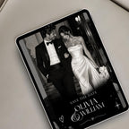 Editorial doodle save the date website displayed on a tablet, featuring elegant black and white couple photography and modern wedding typography.