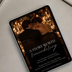 Editorial wedding website displayed on a tablet with romantic candlelit photography and a dedicated couple love story section.