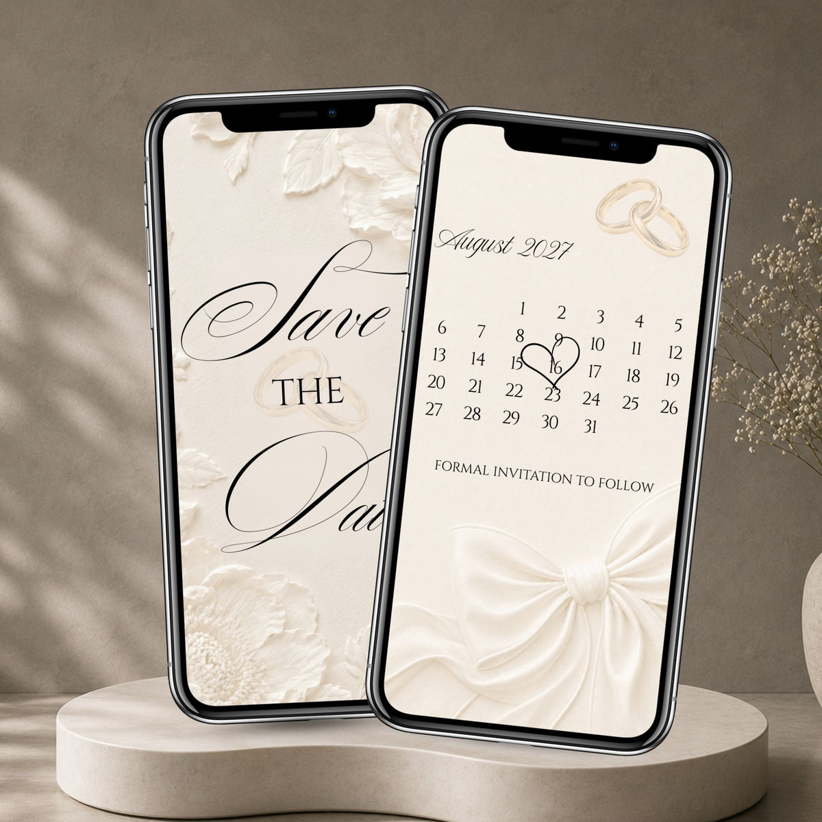 Ivory floral save the date invitation displayed on phones with embossed envelope design, wax seal and wedding date calendar.