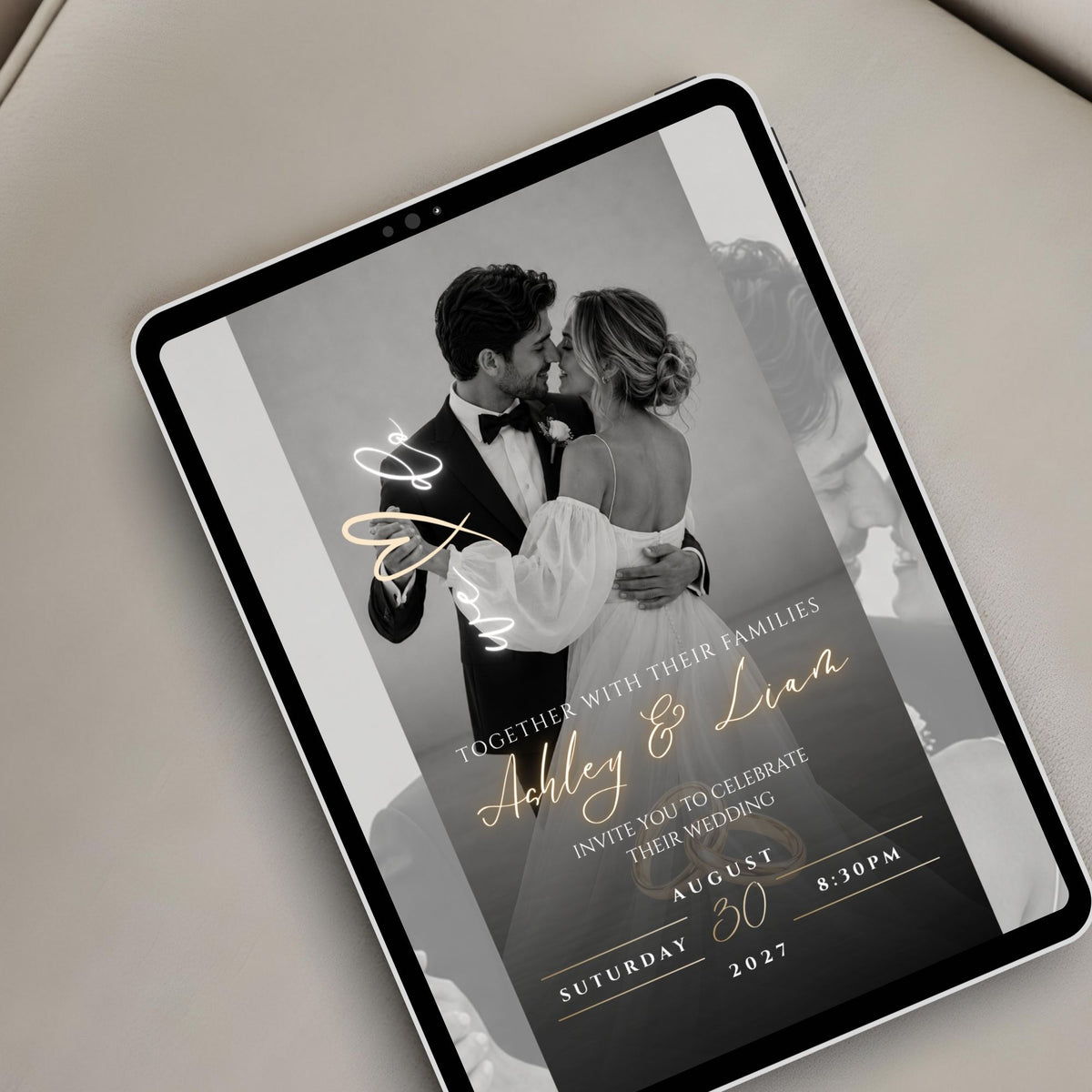 Elegant passport wedding website invitation displayed on a tablet with personalised couple photo and wedding details.