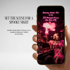 Pink Halloween party video invitation displayed on a phone with personalized event details and a dramatic spooky party aesthetic.